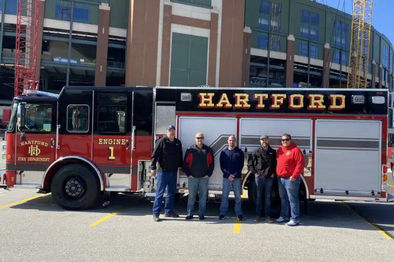 City of Hartford firefighters pose in front of Engine No 1